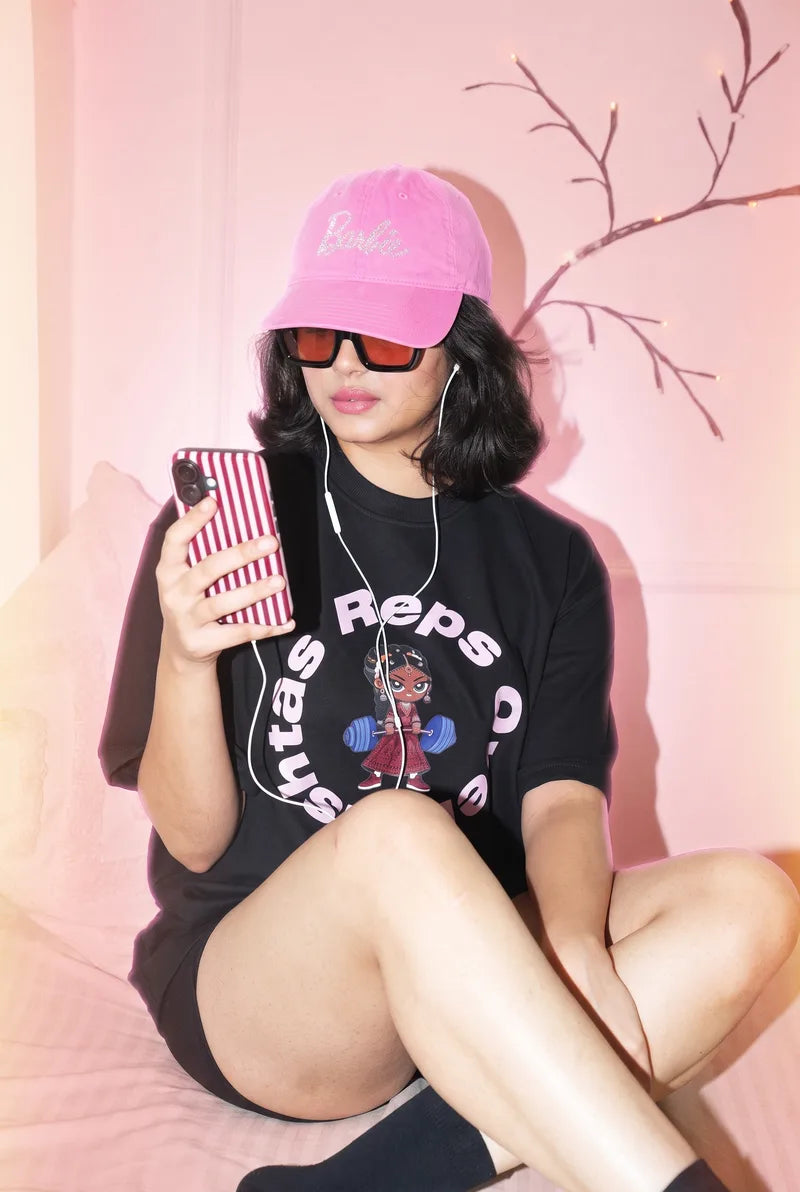 Reps Over Rishtas / Black tee. Long enough to sit cross-legged in.
