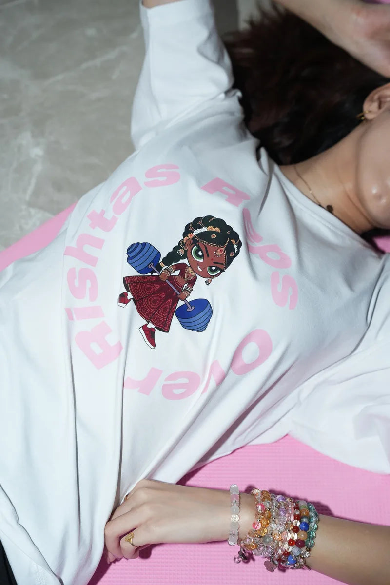 The hand-screened Reps Over Rishtas puff print up close on the Chalk tee